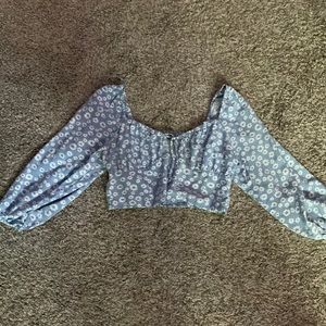 This an off the shoulder cottage core top by wild fable